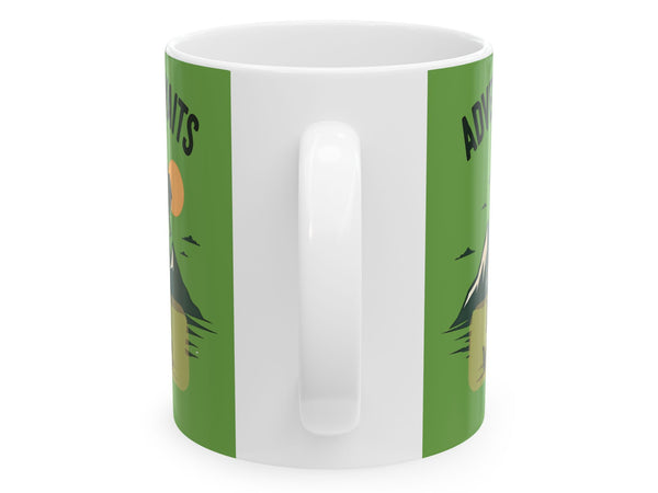 White mug with green stripes featuring nature illustrations on a white background