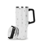 White travel mug with black star pattern and black handle on a white background