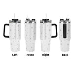 White tumbler with black star patterns and black handles on a white background