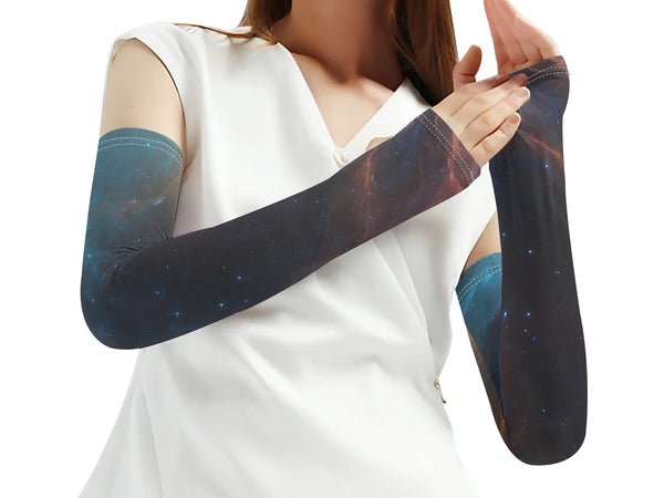 Woman wearing space-themed arm sleeves on a white background