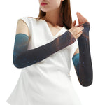 Woman wearing space-themed arm sleeves on a white background