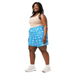 Winter Snowflake Unisex Athletic Shorts - Woman posing side, studio shot | Our Phoenix Rise