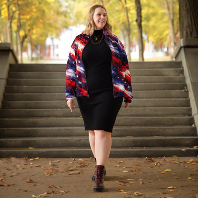 Patriotic Star Bomber Jacket - Woman wearing red white blue bomber jacket over black dress in park | Our Phoenix Rise