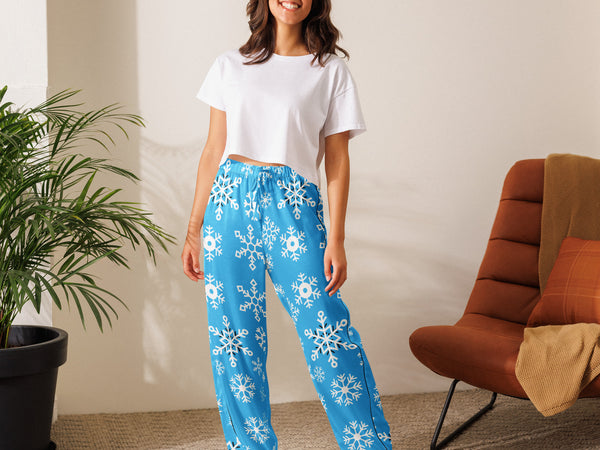 woman in a living room photo with snowflake winter pants