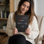 Bad at Games Great at Showing Up Journal - held in hand lifestyle shot | Our Phoenix Rise