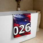 America 250 Patriotic Beach Towel - Draped over white bathtub edge, patriotic galaxy design | Our Phoenix Rise