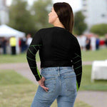 Black Neon Grid Long Sleeve Crop Top - Lifestyle shot, woman in active pose | Our Phoenix Rise