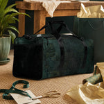 Dark Tropical Floral Duffle Bag - Lifestyle view on shoulder strap | Our Phoenix Rise