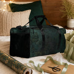 Dark Tropical Floral Duffle Bag - Lifestyle view in outdoor setting | Our Phoenix Rise