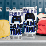 Gamer Travel Mug Boss Level Unlocked - Lifestyle shot at a gaming setup | Our Phoenix Rise