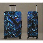 Blue Geometric Luggage Cover - Front and side views | Our Phoenix Rise