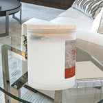 Right side angle of Cinnamon Chai soy blend candle. Close-up on the frosted glass finish.