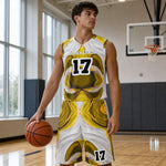 Custom Basketball Uniform Set - Player Holding Basketball on Court | Our Phoenix Rise