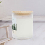 Left side angle of Frasier Fir winter wellness candle showing the sleek vessel shape.