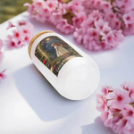 Imagination Garden Frosted Glass Tumbler - Angled Top View with Pink Flower Background | Our Phoenix Rise