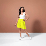 Yellow Leaf Print Skater Skirt - Side view on model showing flared cut | Our Phoenix Rise