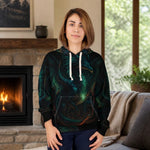 Glowing Green Dragon Hoodie - Lifestyle shot, side profile on woman in dark setting | Our Phoenix Rise