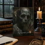 Gothic Horror Hardcover Journal - Lifestyle View on Desk with Spooky Decor | Our Phoenix Rise