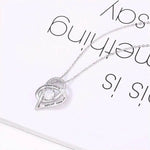 Personalized Sentimental Heart Necklace - Overhead view of pendant on white background | Our Phoenix Rise