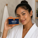 Kojic Acid Turmeric Soap - human hand holding bar, close up | Our Phoenix Rise