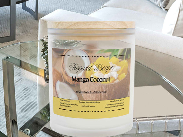 Front view of Mango Coconut Tropical Escape scented aromatherapy candle in a frosted glass jar. Features a raw maple wood lid.