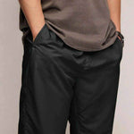 Black Flame Water Resistant Track Pants - model in casual everyday wear | Our Phoenix Rise