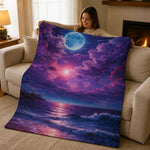 Moonlit Ocean Quilted Throw Blanket - on a couch with person relaxing, lifestyle shot | Our Phoenix Rise