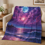 Moonlit Ocean Quilted Throw Blanket - draped over a beige sofa in a cozy living room | Our Phoenix Rise