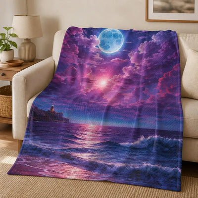 Moonlit Ocean Quilted Throw Blanket - draped over a beige sofa in a cozy living room | Our Phoenix Rise