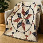 Quilt beige with blue and red star pattern draped on armchair | Our Phoenix Rise