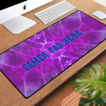 Personalized Purple Gaming Desk Mat - Gamer Tag on Desktop with Monitor and Keyboard | Our Phoenix Rise