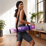 Rolled purple galaxy yoga mat with black straps carried over shoulder | Our Phoenix Rise