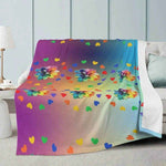 Rainbow Floral Throw Blanket - Draped over a sofa in a living room | Our Phoenix Rise