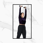 Soaring Bird Cropped Rash Guard Women's UPF 50+ - Front view of woman in deep violet cropped rash guard showing cropped hem | Our Phoenix Rise