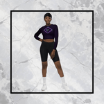 Soaring Bird Cropped Rash Guard Women's UPF 50+ - Woman posing in deep violet cropped rash guard with bird logo | Our Phoenix Rise