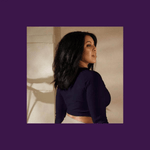 Soaring Bird Cropped Rash Guard Women's UPF 50+ - Close up of woman in deep violet cropped rash guard showing raglan sleeves | Our Phoenix Rise