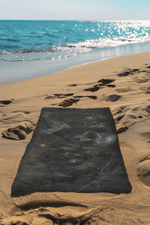 Gothic Skull Beach Towel - Flat Lay on Sandy Beach | Our Phoenix Rise