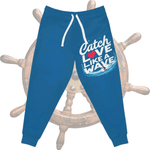Blue Surfer Print Joggers - Detail of 'Catch Love Like a Wave' graphic | Our Phoenix Rise