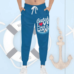 Blue Surfer Print Joggers - Lifestyle shot lounging | Our Phoenix Rise