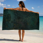 dark green hibiscus tropical beach towel - woman holding towel | Our Phoenix Rise