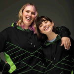 Neon Geometric Hoodie - Two Women Smiling Front View | Our Phoenix Rise