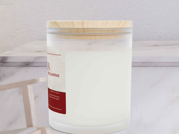 Left side angle of Vanilla frosted glass candle showing the sleek vessel shape and premium wood lid texture.