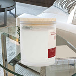 Right side angle of Vanilla soy blend candle. Close-up on the frosted glass finish and eco-friendly wax fill.