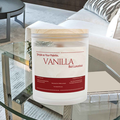 Front view of Vanilla Bean scented aromatherapy candle in a frosted glass jar. Features a raw maple wood lid.