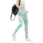 Teal Daisy Print Leggings - Angled Front View | Our Phoenix Rise