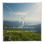 Zodiac Sign Necklace - Silver Aries pendant on scenic background card | Our Phoenix Rise